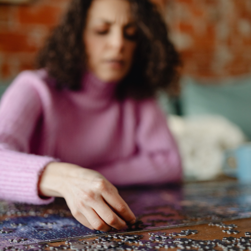 woman working puzzle