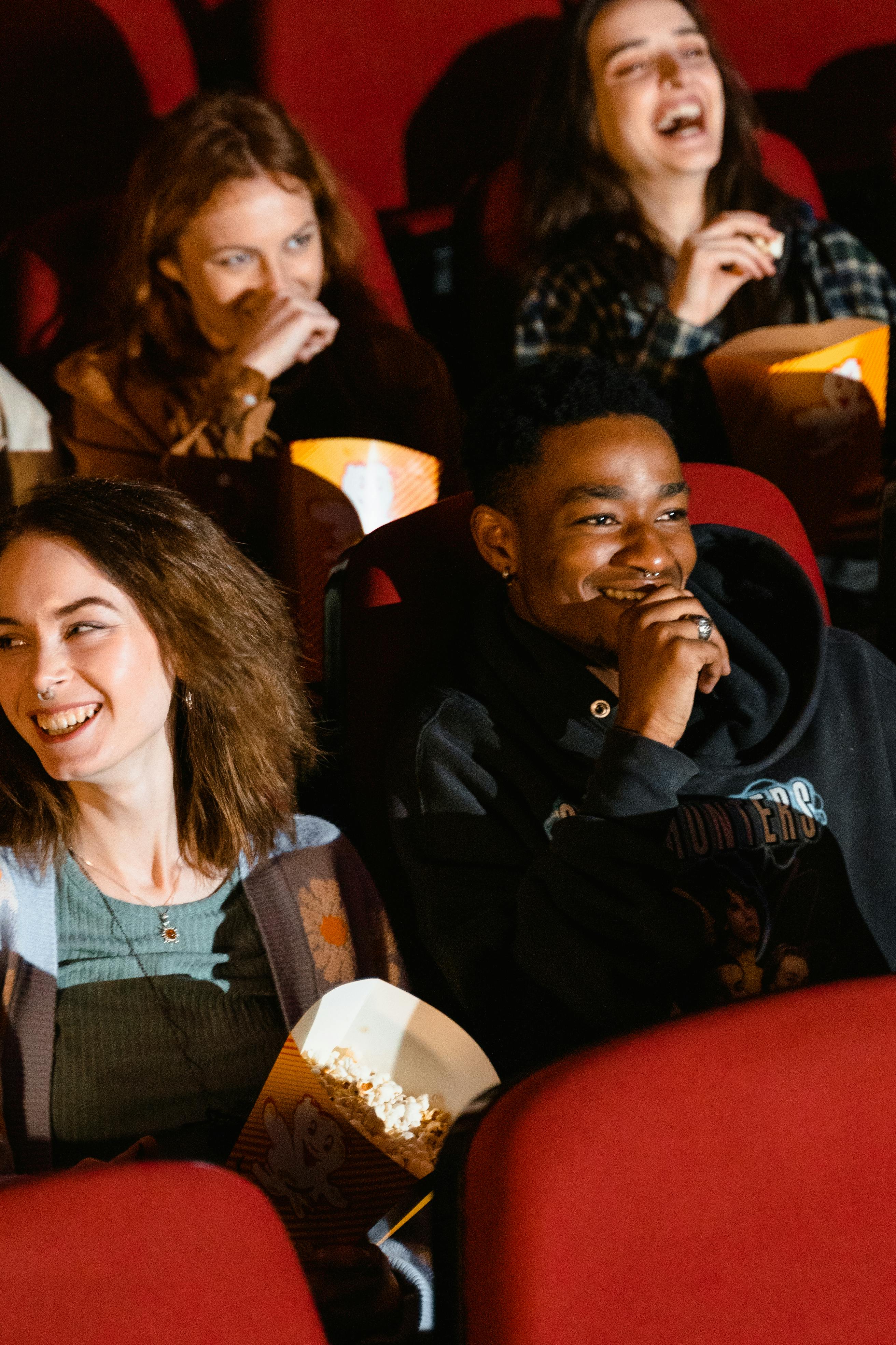 Laughing multicultural movie audience