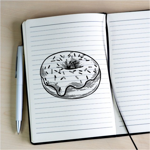 A notebook with a donut on it