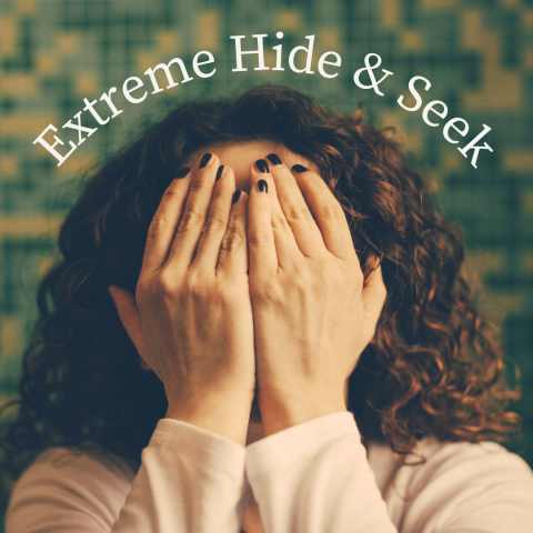 Woman hiding her face with her hands. "Extreme Hide & Seek"