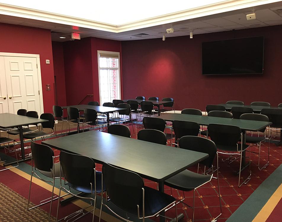 Walldorf Meeting Room with tables, chairs and screen