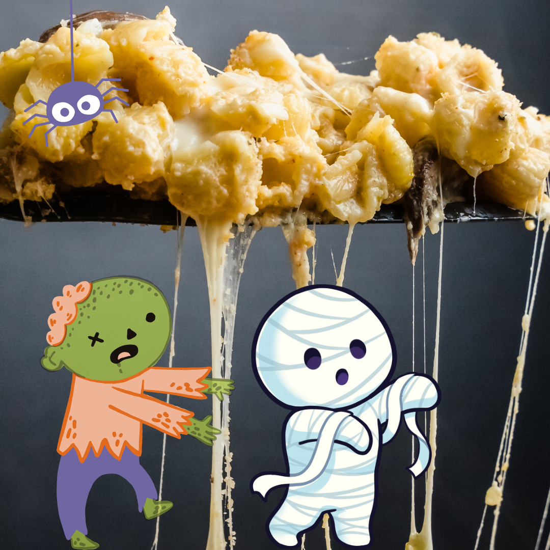 photograph of mac and cheese with cartoon monsters