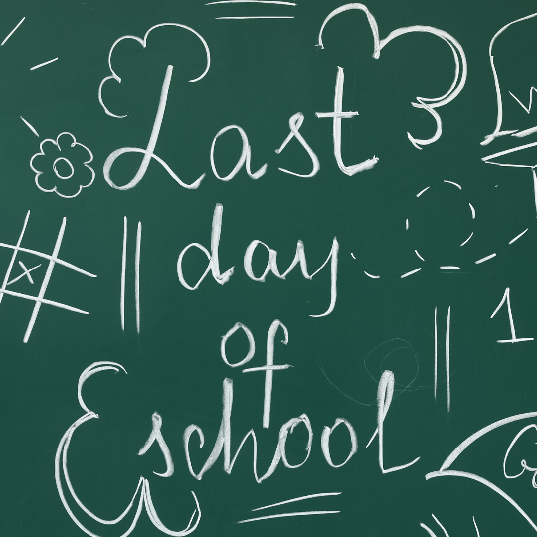 "Last day of school" written in chalk on a chalkboard