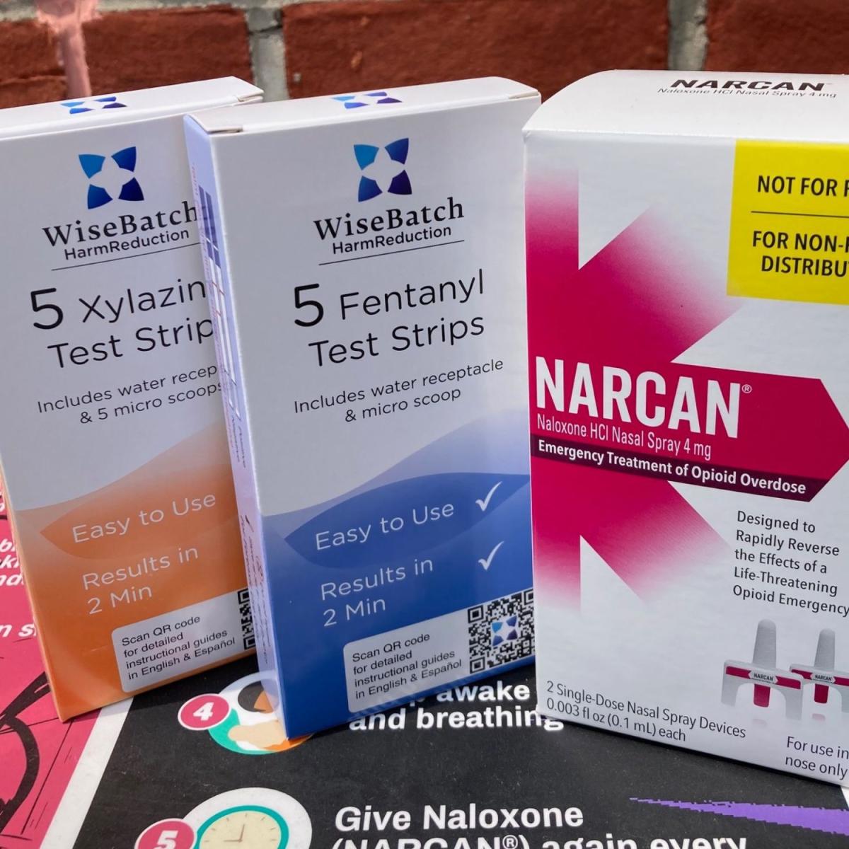 boxes of drug testing strips and naloxone